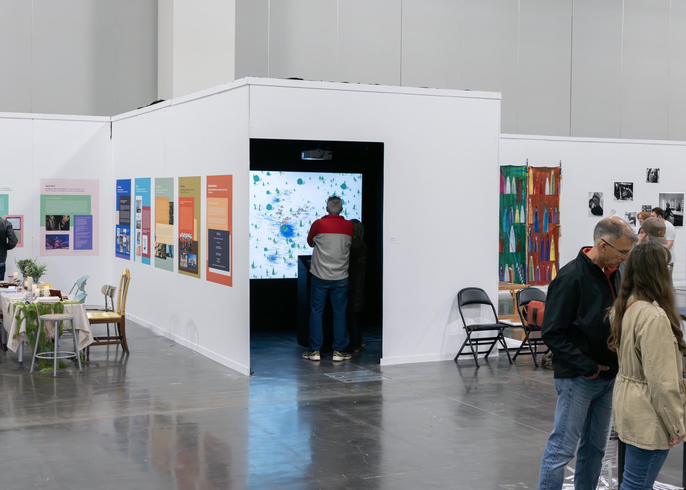 The black room from the hall, with visitors inside