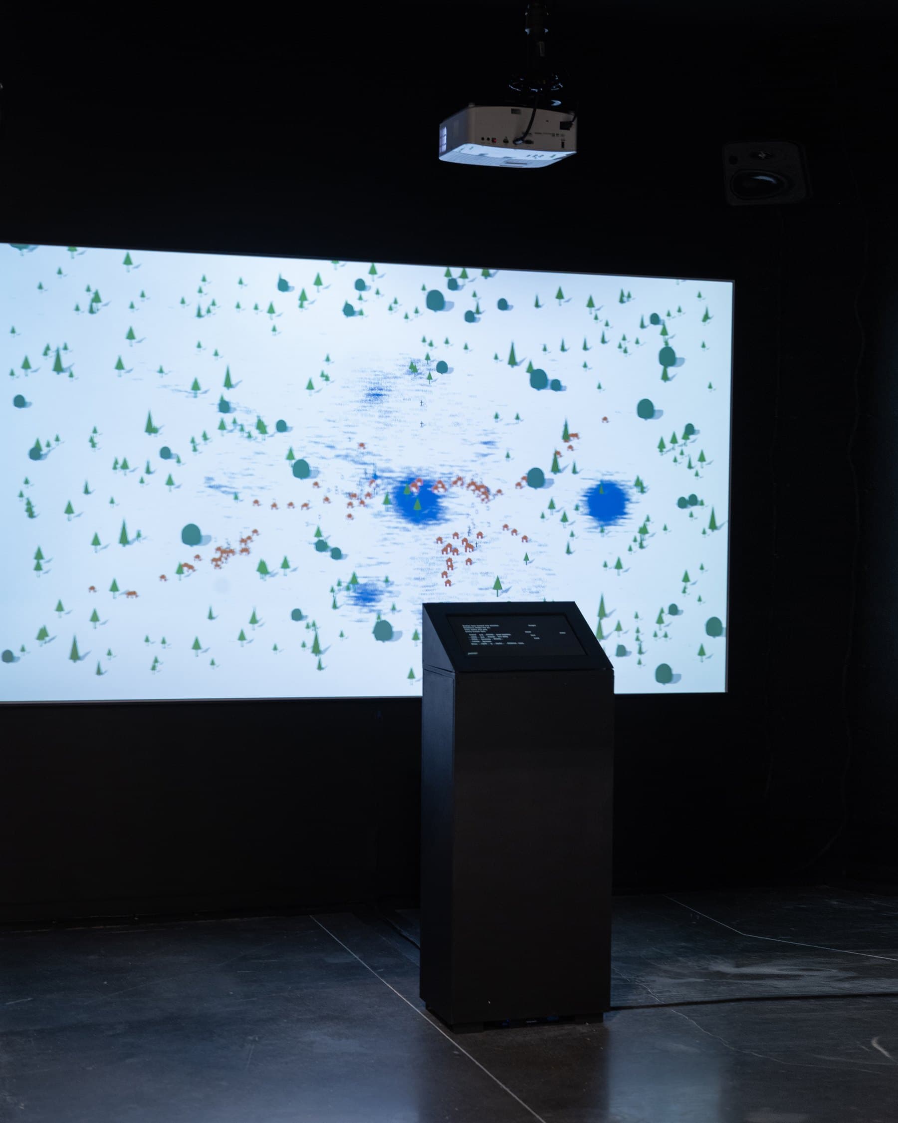 The empty room: screen, plinth, projector, speaker